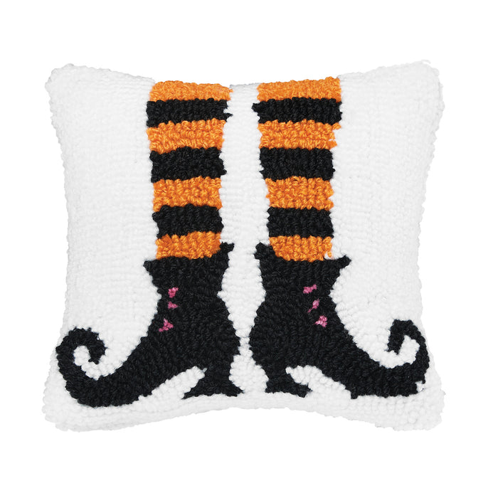 A 8in. x 8in. Witch Feet Hooked Mini Pillow.