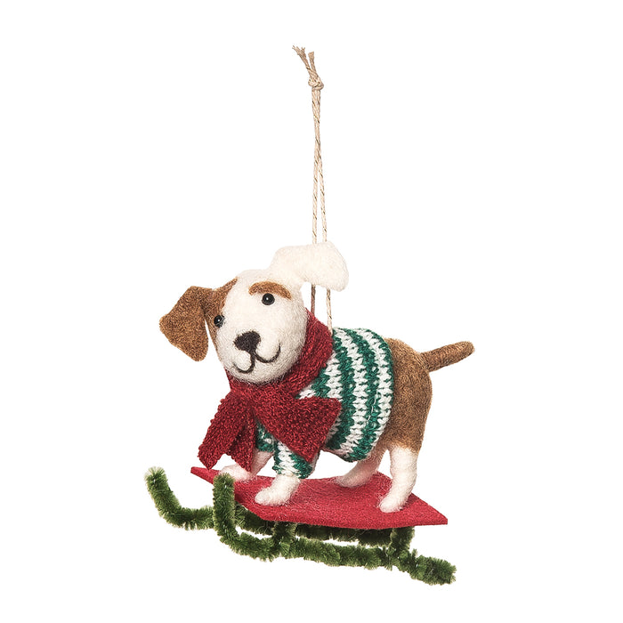 A Green Sweater Sleigh Dog Ornament.