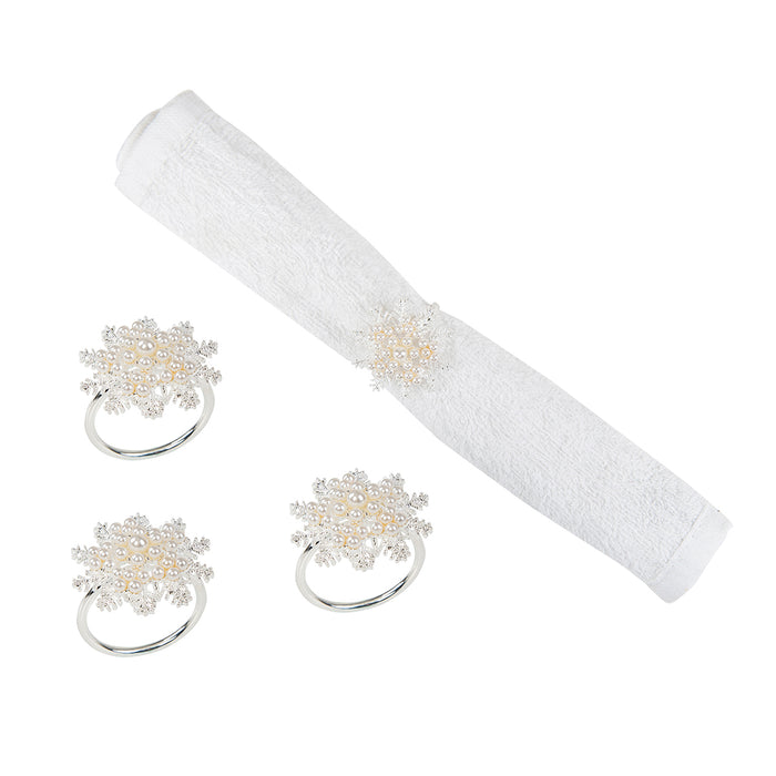 A Pearl Snowflake Napkin Ring, Set of 4.