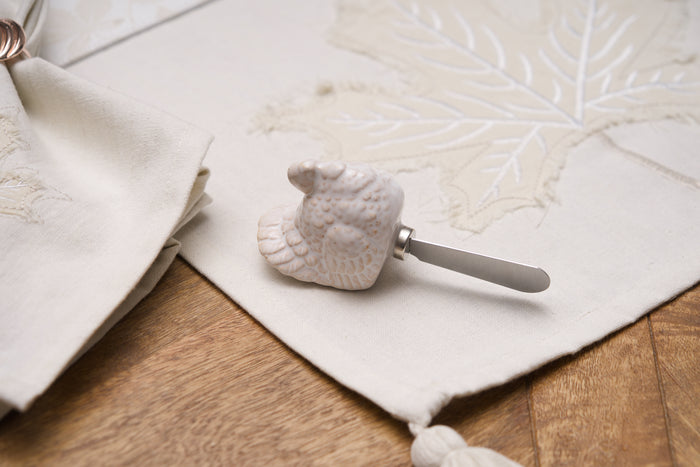 A White Turkey Spreader.