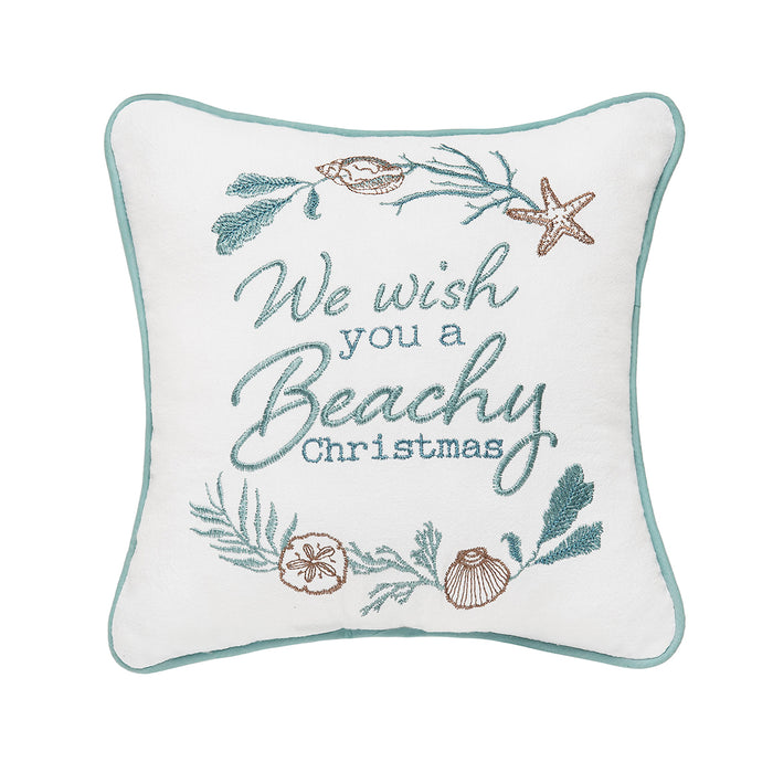 A 10in. x 10in. Beachy Christmas Mini Pillow.