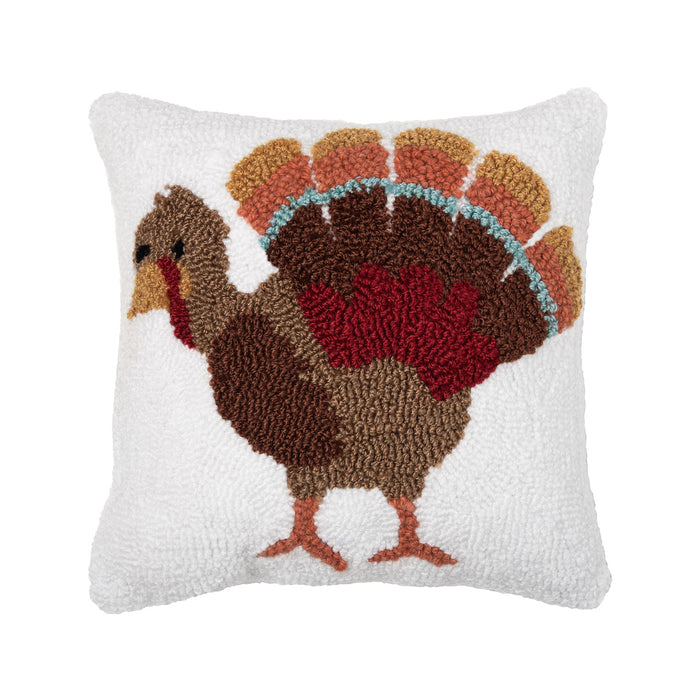 A 12in. x 12in. Turkey Feathers Hooked Mini Pillow.