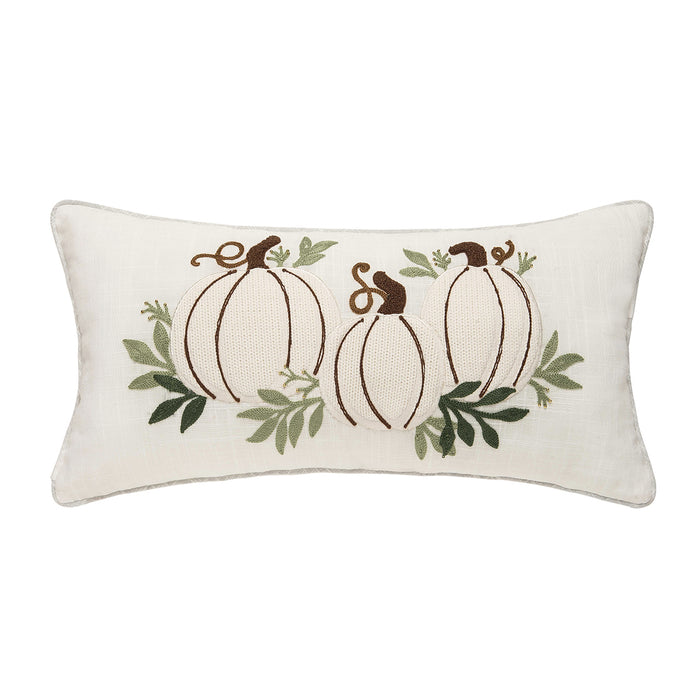 A 12in. x 24in. White Pumpkin Trio Pillow.