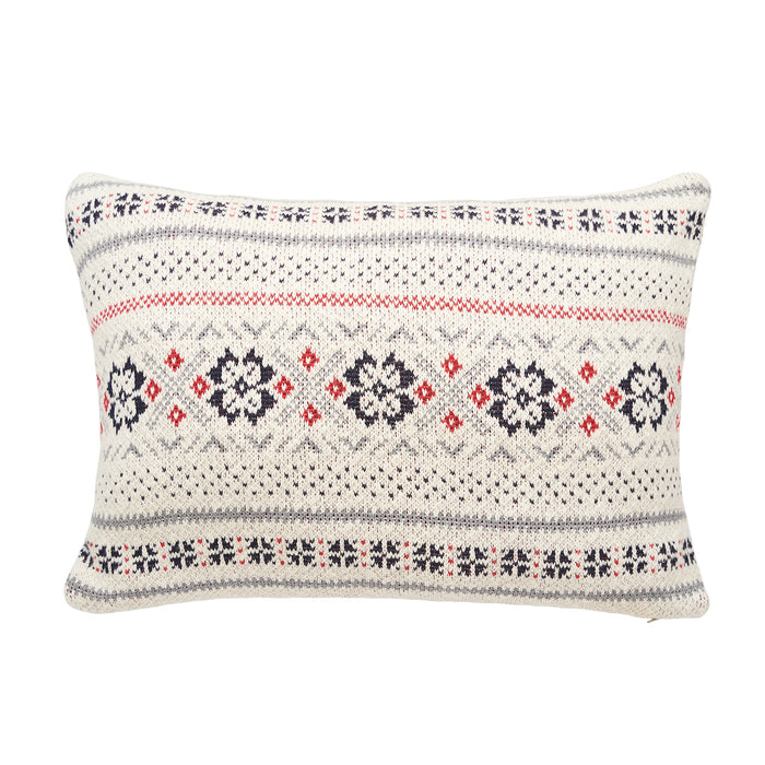 A 16in. x 24in. Snowflake Pillow.