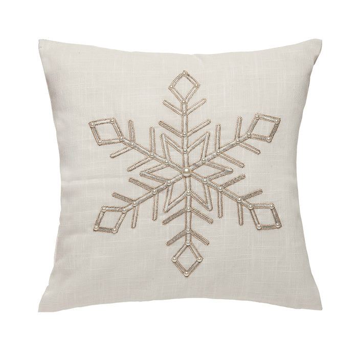 A 18in. x 18in. Champagne Snowflake Pillow.