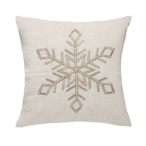 A 18in. x 18in. Champagne Snowflake Pillow.