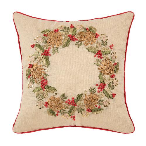 A 18in. x 18in. Merry Wreath Pillow.
