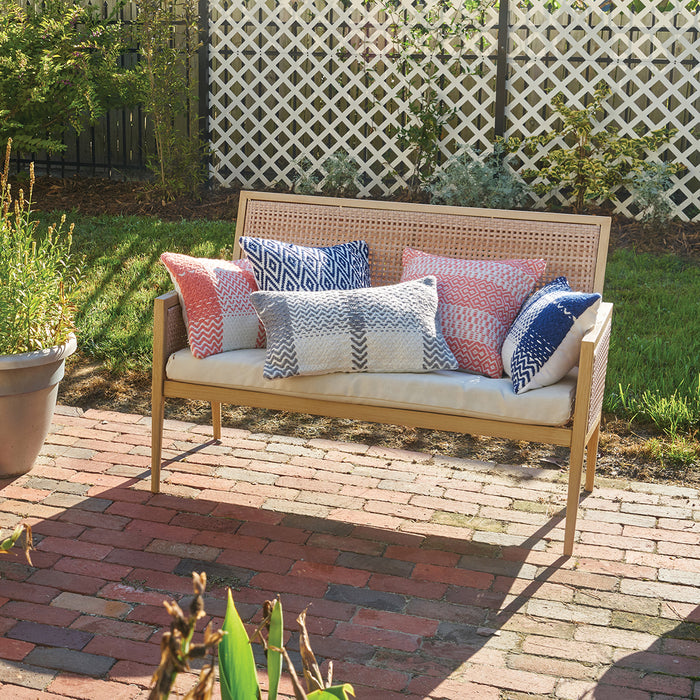 A 18in. x 18in. Pim Diamond Stripe Indoor Outdoor Pillow.