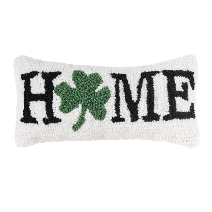 A 6in. x 12in. Shamrock Home Hooked Mini Pillow.