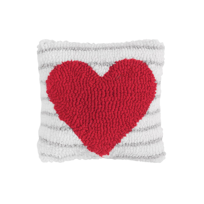 A 8in. x 8in. Heart Stripe Hooked Mini Pillow.