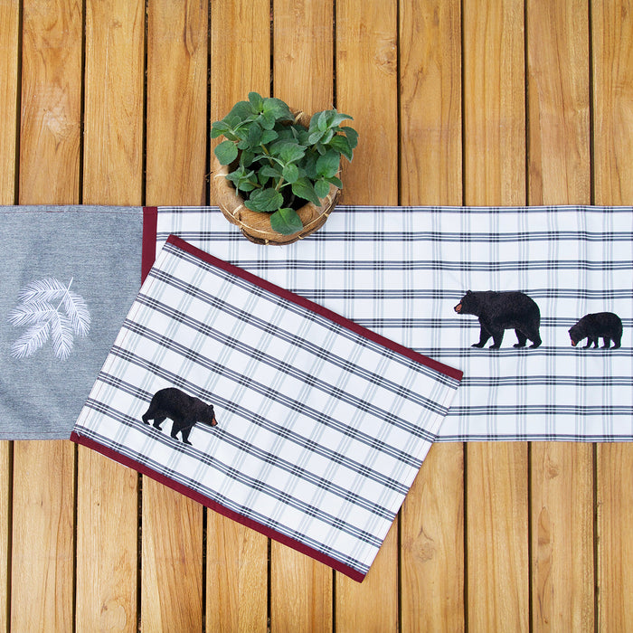 Bear Lodge Outdoor Table Linens table linens displayed as a coordinated tabletop setting.
