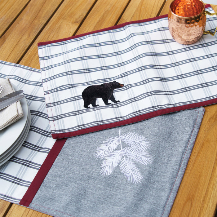 Bear Lodge Outdoor Table Linens table linens displayed as a coordinated tabletop setting.