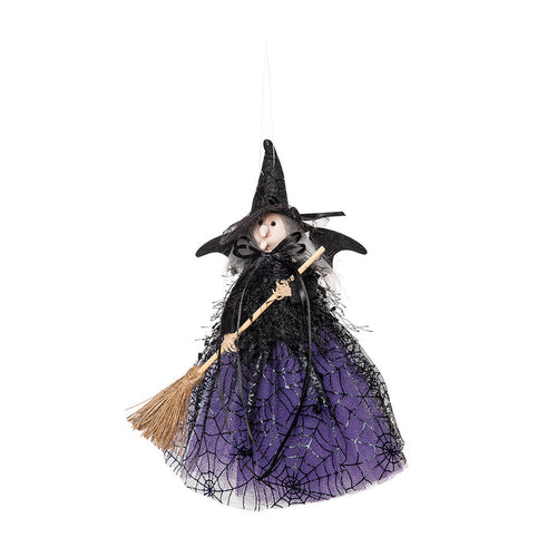 A Black & Purple Witch Ornament.