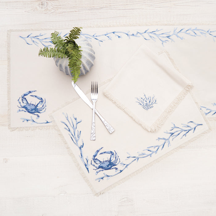 Blue Coral Bay Table Linens table linens displayed as a coordinated tabletop setting.