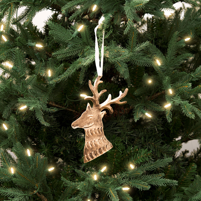 A Brass Metal Reindeer Ornament.