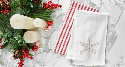 A Champagne Snowflake Flour Sack Kitchen Towel.