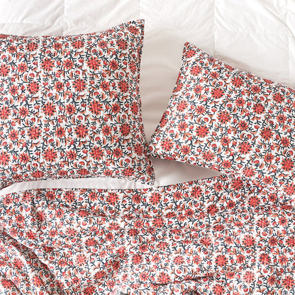 A Colley Quilt displayed on a made bed.