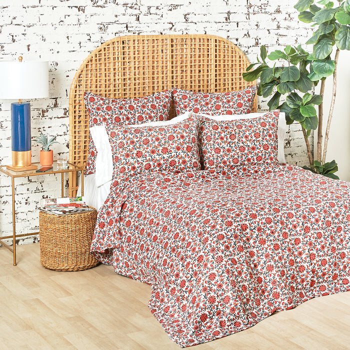 A Colley Quilt displayed on a made bed.