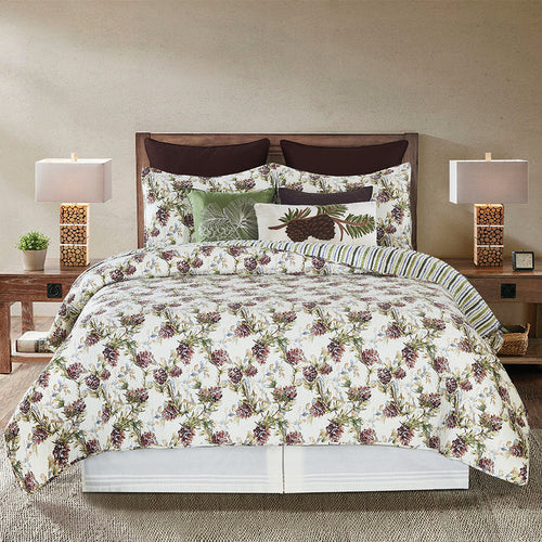A Cooper Pines Quilt Set displayed on a made bed.