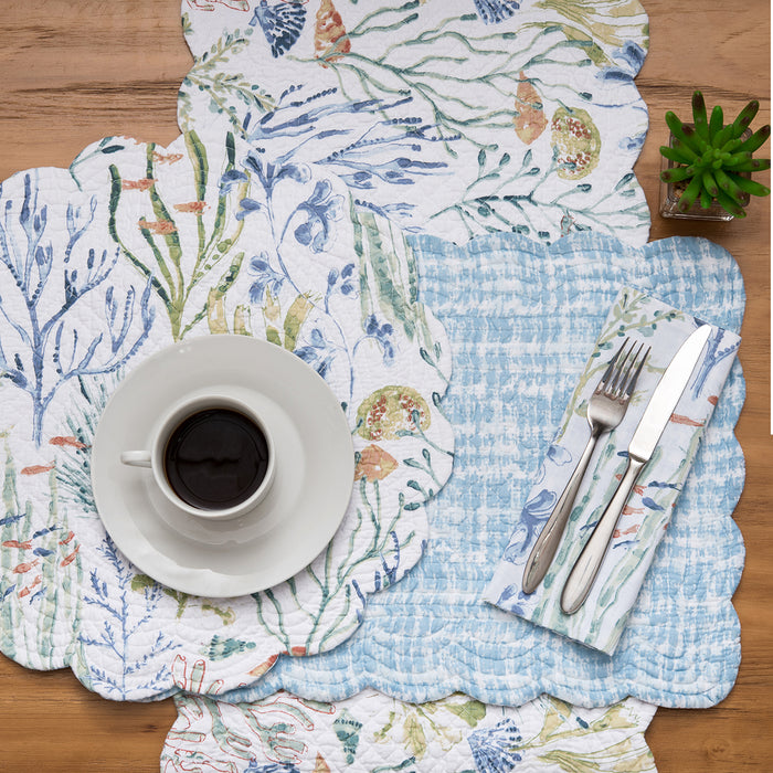 Coralie Sound Table Linens table linens displayed as a coordinated tabletop setting.
