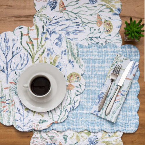 Coralie Sound Table Linens table linens displayed as a coordinated tabletop setting.