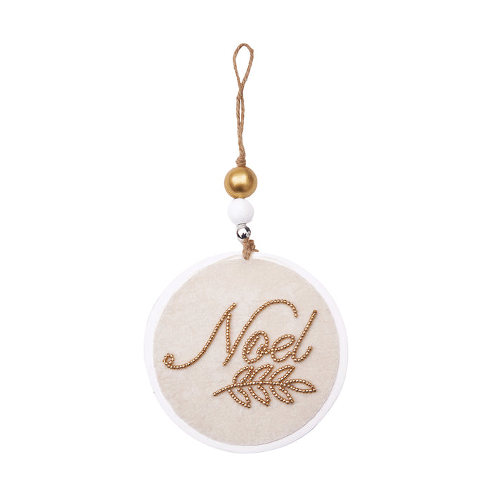 A Embellished Noel Ornament.