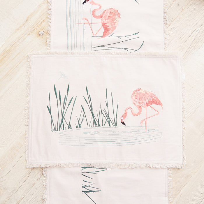 Flamingo Table Linens table linens displayed as a coordinated tabletop setting.