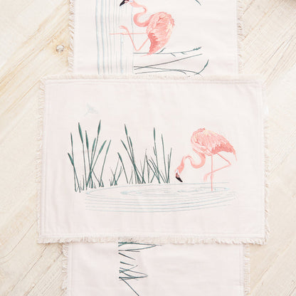 Flamingo Table Linens table linens displayed as a coordinated tabletop setting.
