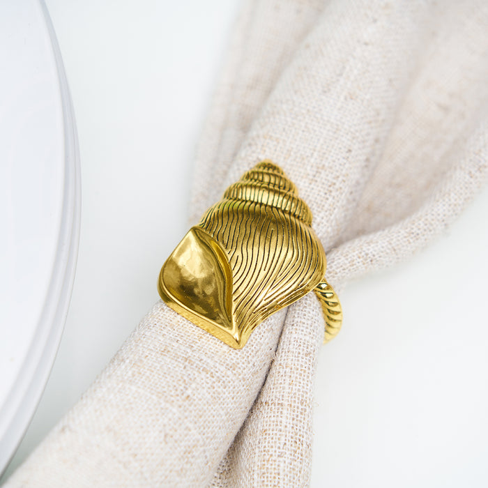 A Gold Conch Shell Napkin Ring, Set of 4.