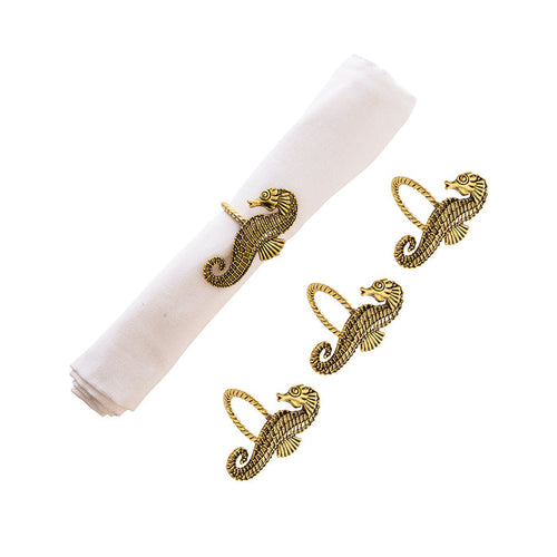 A Gold Seahorse Napkin Ring, Set of 4.
