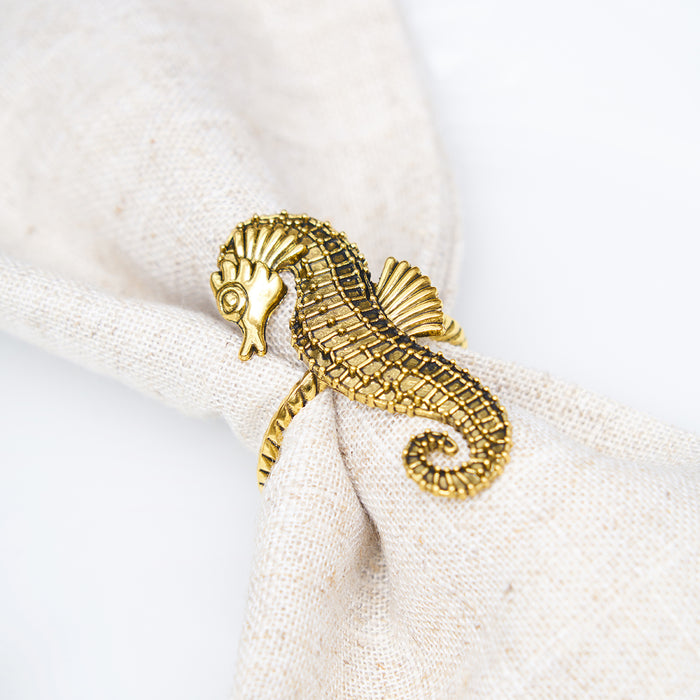 A Gold Seahorse Napkin Ring, Set of 4.