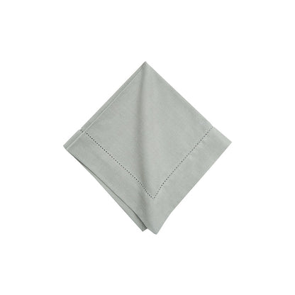 Hemstitch Table Linens table linens displayed as a coordinated tabletop setting.