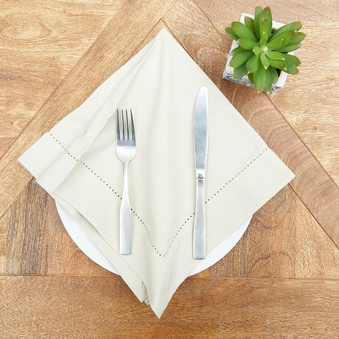 Hemstitch Table Linens table linens displayed as a coordinated tabletop setting.