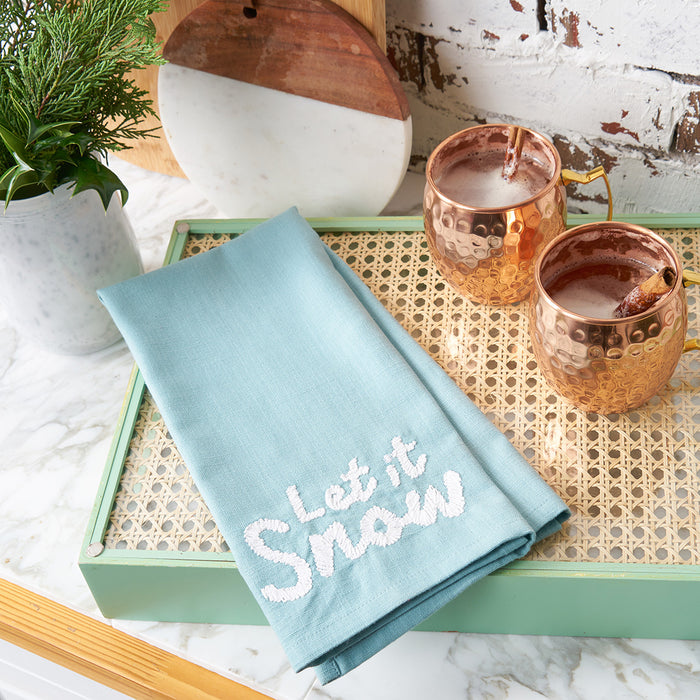 A let it snow woven towel.