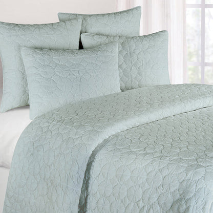 A Mara Quilt displayed on a made bed.