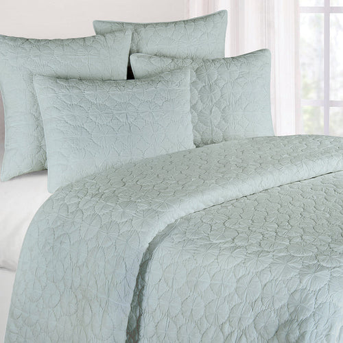 A Mara Quilt displayed on a made bed.