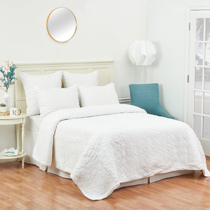A Mara Quilt displayed on a made bed.