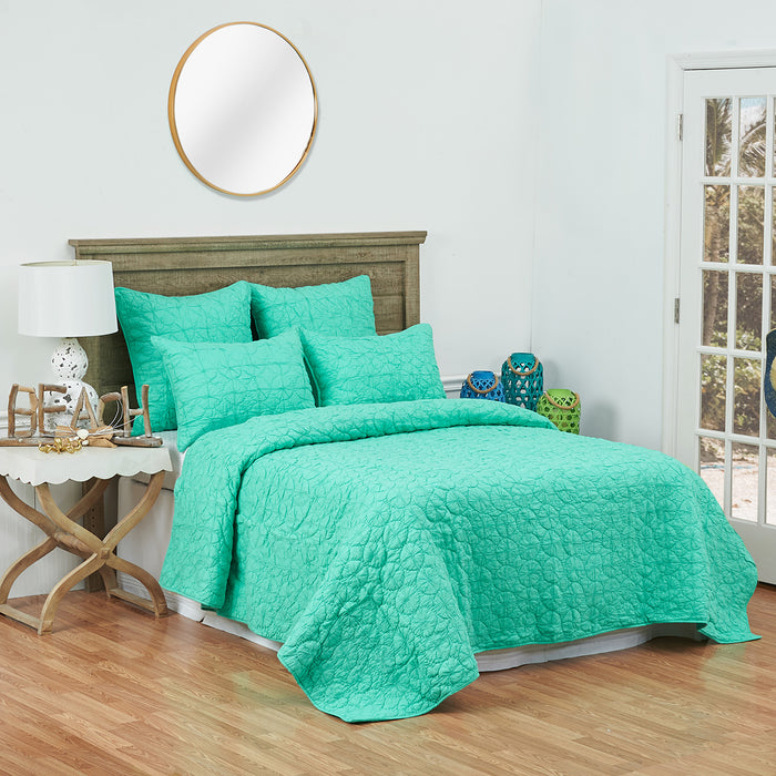 A Mara Quilt displayed on a made bed.