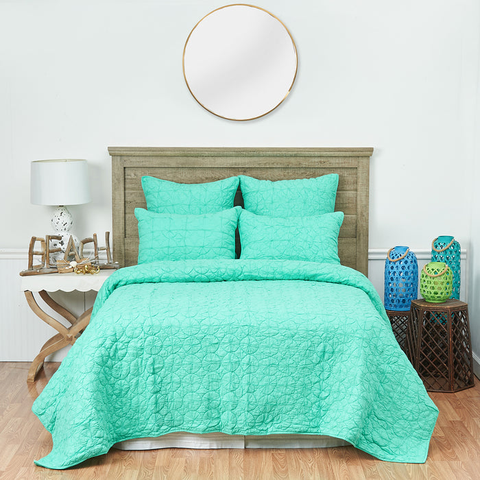 A Mara Quilt displayed on a made bed.