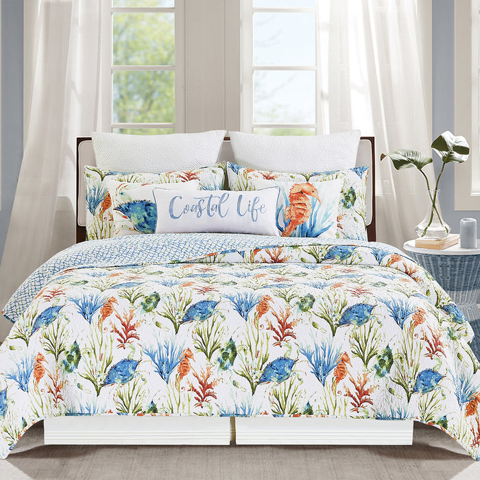 A Marino Quilt Set displayed on a made bed.
