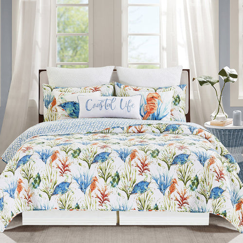 A Marino Quilt Set displayed on a made bed.