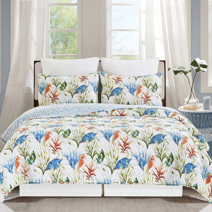 A Marino Quilt Set displayed on a made bed.