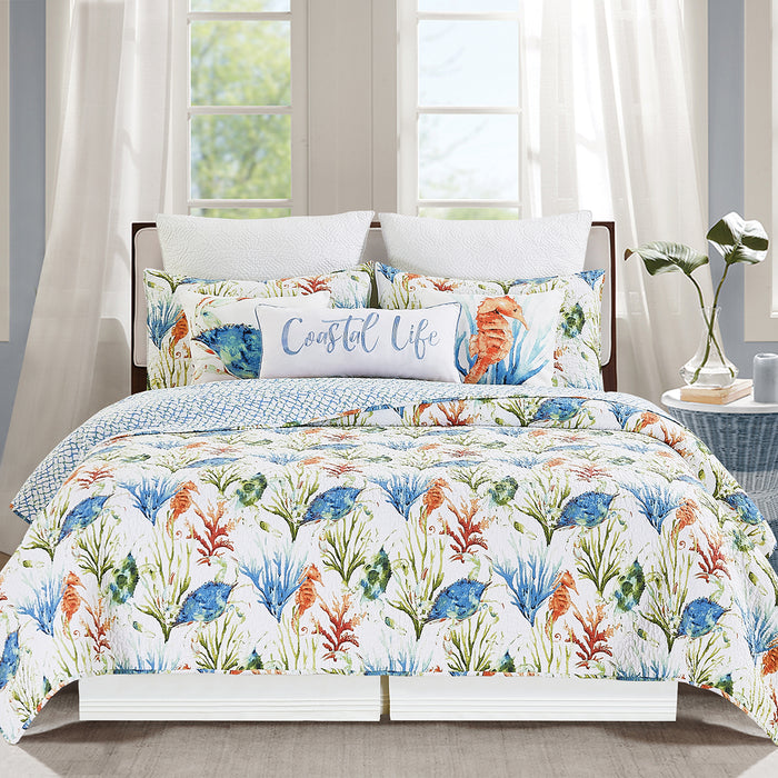 A Marino Quilt Set displayed on a made bed.