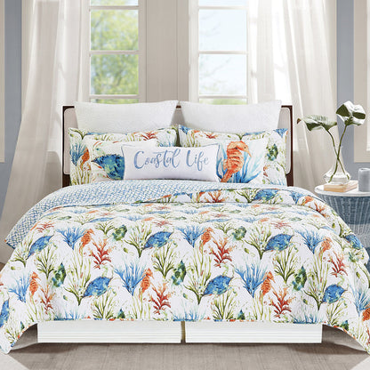 A Marino Quilt Set displayed on a made bed.