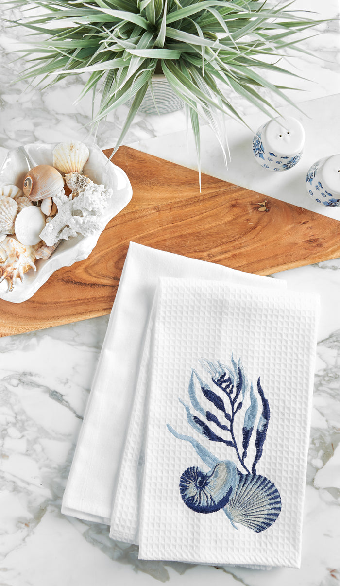 A Midnight Lagoon Shells Waffle Weave Kitchen Towel.