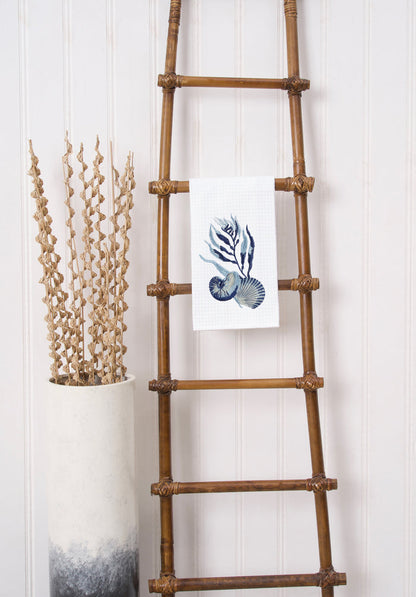 A Midnight Lagoon Shells Waffle Weave Kitchen Towel.