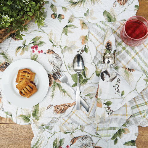 Mira Songbird Table Linens table linens displayed as a coordinated tabletop setting.