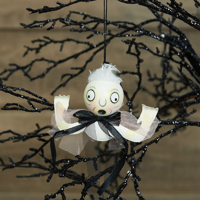 A Morphieus Tin Ornament.