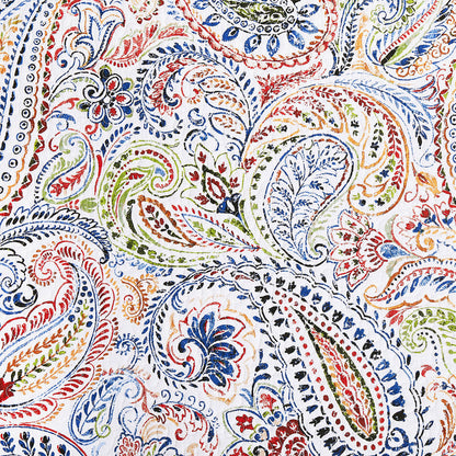 A Payton Paisley Quilt Set displayed on a made bed.