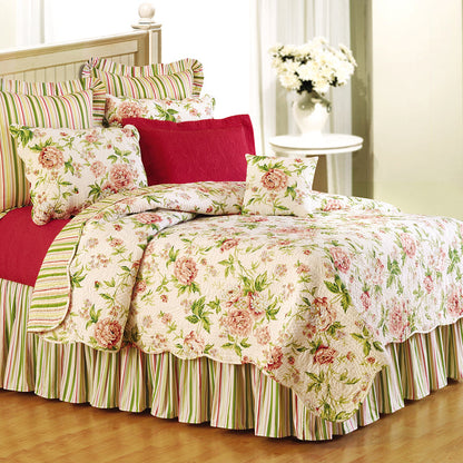 A Pink Brianna Quilt displayed on a made bed.